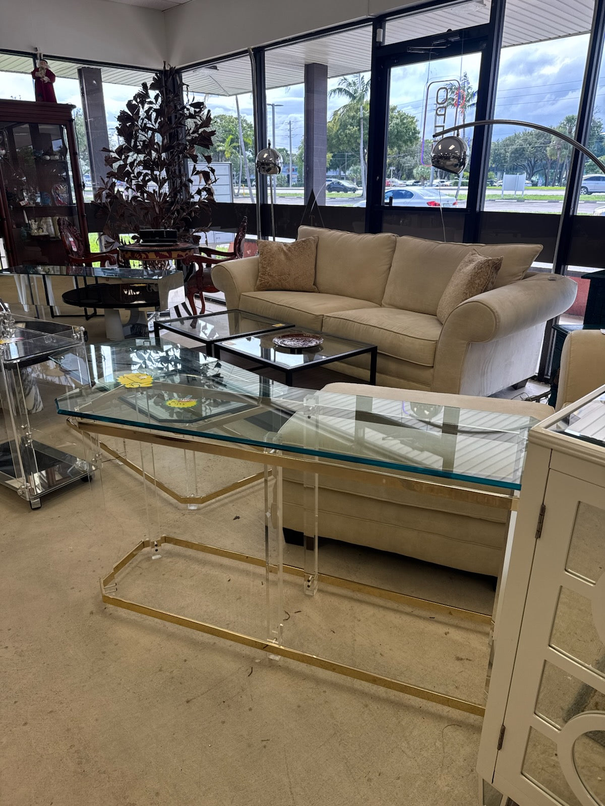 Sofa, glass tables and lighting at Off The Avenue Furniture
